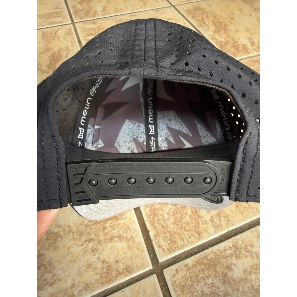 Melin A-Game Hydro Black Performance Snapback Hat 60cm L/XL Water Resistant
